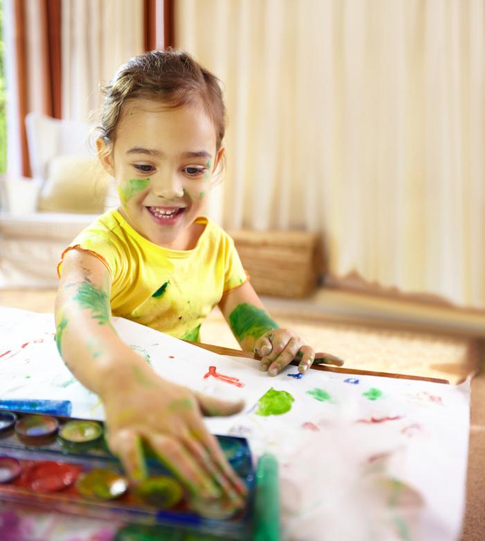 Finger painting fun.
